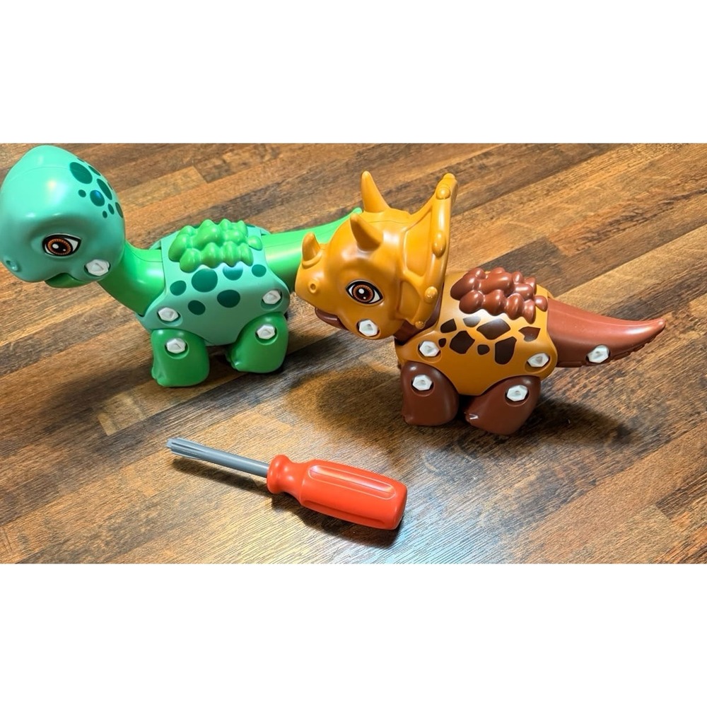 Plastic toy take apart dinosaurs with screws and screwdriver. STEM, dexterity